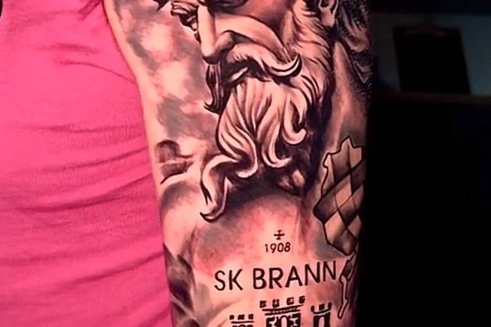 Bearded figure in a large arm composition